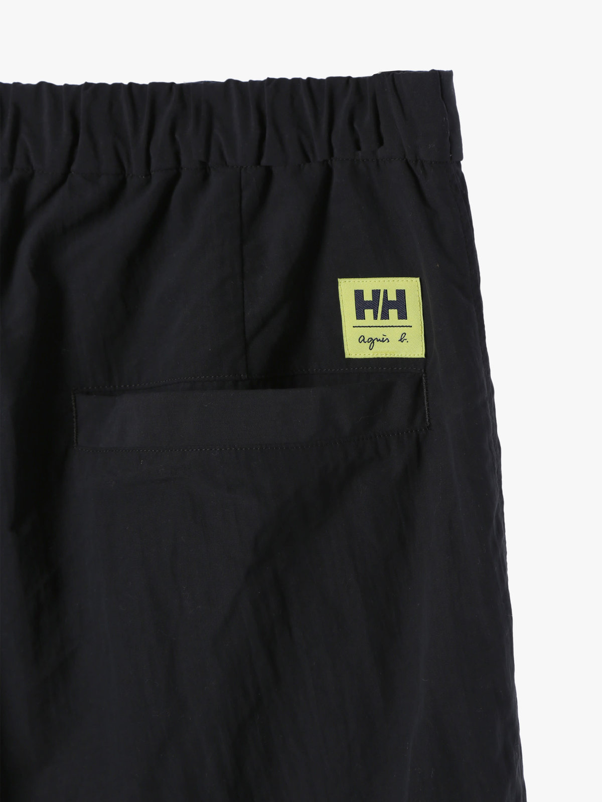FEMME ウィメンズ agnes b. x HELLY HANSEN NF ウィンドブレーカーパンツ ブラック
